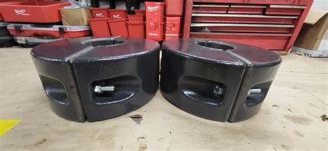 mustang skid steer counterweights|bobcat skid steer wheel weights.